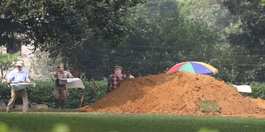 The remains of soldiers are being exhumed by digging into the soil.